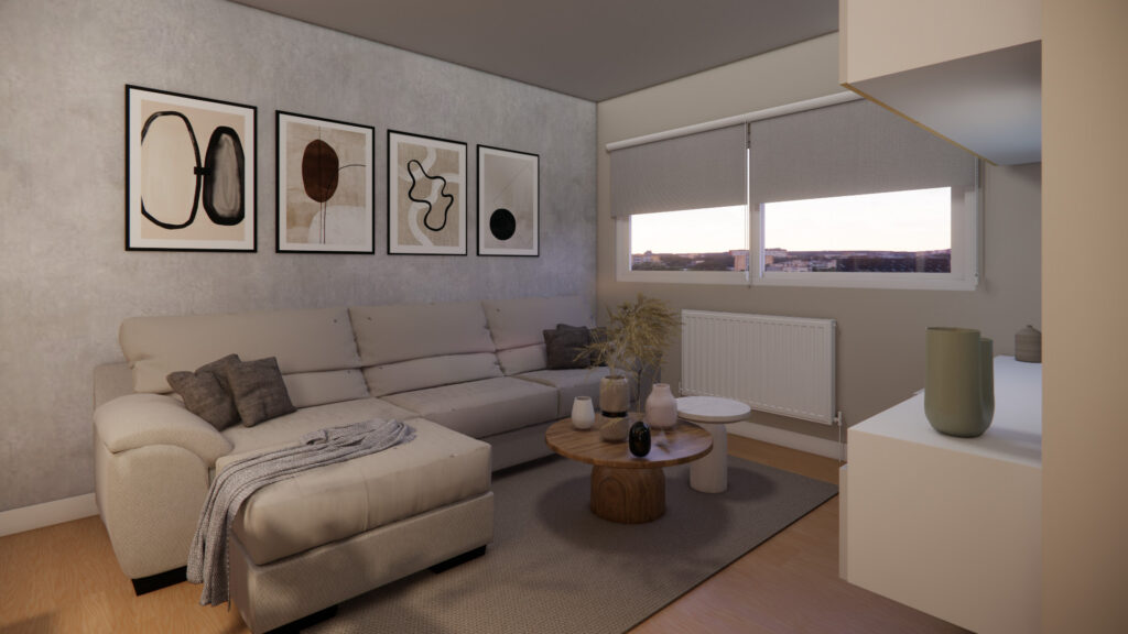 Área de la sala con un sofá y ventana del apartamento.